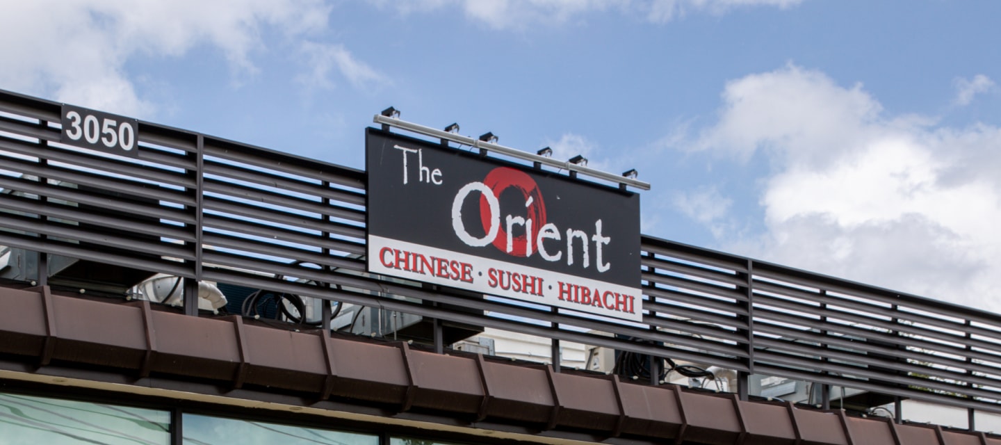 The Orient’s exterior sign, reading Chinese, Sushi and Hibachi
