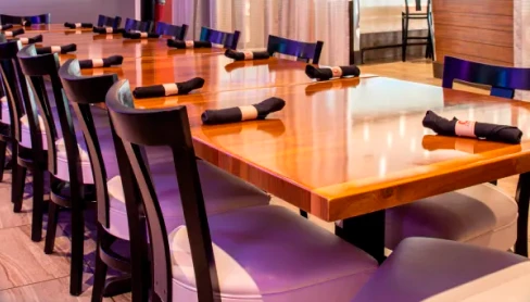 A long table set for a private event at The Orient